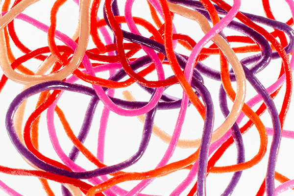 Pack of Trina’s Squirm Worm Material in soft, flexible strands for tying San Juan Worms and squirmy patterns.