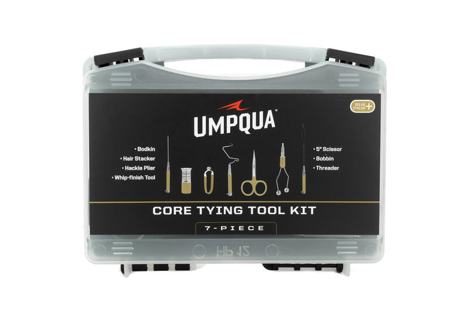 Umpqua Dream Stream Plus 7-piece fly tying kit – premium tool set featuring high-quality scissors, bobbin, whip finisher, bodkin, hackle pliers, and dubbing tools in a zip case.