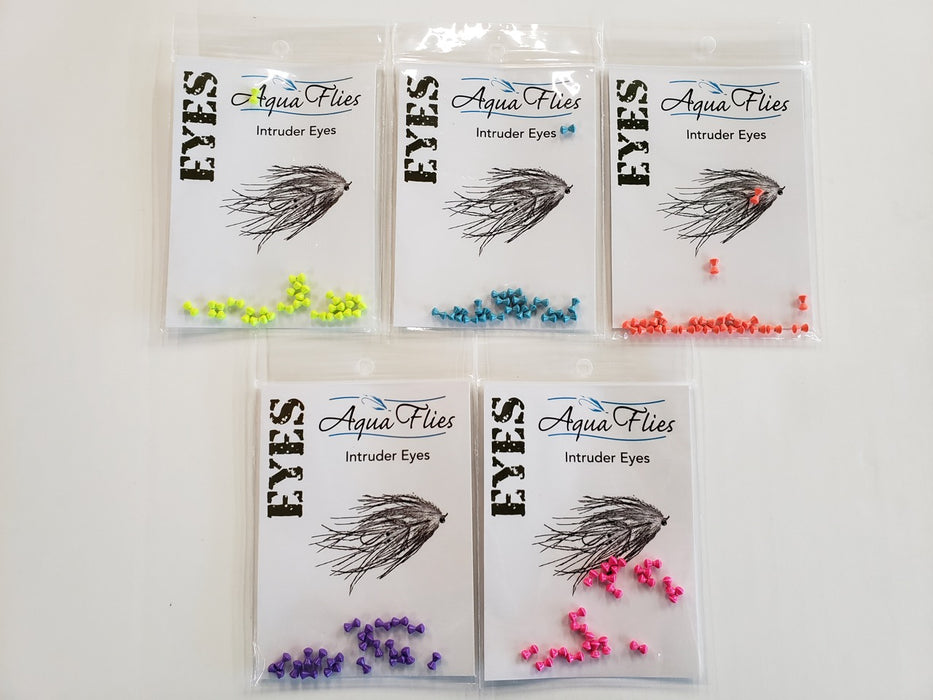 Assorted Aqua Flies Intruder Eyes – 4mm hourglass-style dumbbell eyes in a variety of fluorescent and natural colors for tying intruders and streamer patterns.