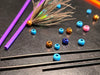 Aqua Flies Tube Beads – precision-molded fly tying beads in multiple sizes and finishes, used to add weight and flare to tube flies and intruders.