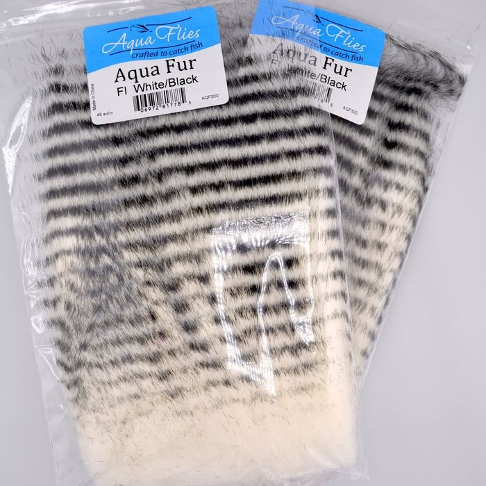 Aqua Fur fly tying material in Fluorescent White/Black – synthetic dubbing fiber with natural movement and vibrant color.