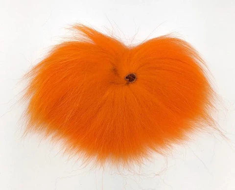 Bright orange Blue Fox fur for fly tying – popular choice for egg patterns, intruders, and attractor flies.