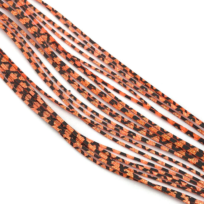 Barred Crazy Legs in Orange/Gold by Hareline – vibrant silicone legs with striking orange and gold contrast, ideal for steelhead, salmon, and warmwater flies.