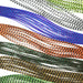Barred Crazy Legs by Hareline – ultra-lively silicone fly tying legs with barred patterning for added realism, movement, and contrast in streamers, nymphs, and saltwater patterns.