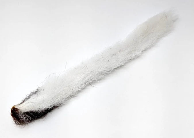 Calf Tail in white – classic fly tying material used for parachute posts, wings, and high-visibility dry fly accents.