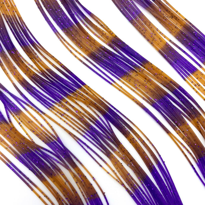 Purple Pumpkin Fly Enhancer Legs by Hareline combine rich, earthy tones with subtle flash—perfect for adding realistic movement and contrast to buggers, crawfish, and bass patterns.