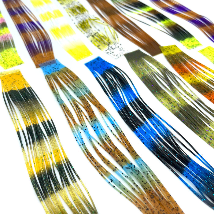 Hareline Fly Enhancer Legs are premium silicone fly tying legs that add irresistible movement, vibrant color, and natural lifelike action to your flies. Perfect for streamers, hoppers, stoneflies, and saltwater patterns, these durable rubber legs are a go-to material for enhancing realism and strike-triggering motion in both freshwater and saltwater flies.