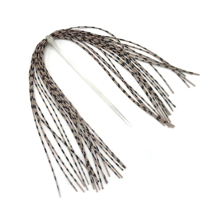Medium Grizzly Barred Legs in Tan by Hareline—fly tying legs with tan coloring and grizzly-style markings for a lifelike addition to terrestrial and aquatic insect imitations.