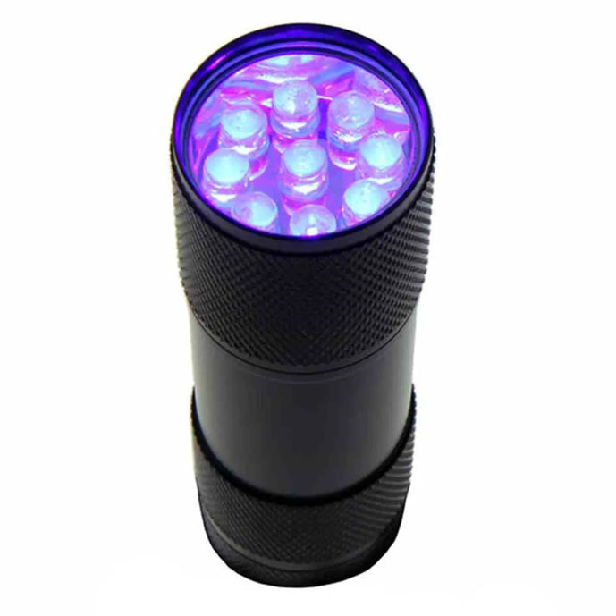 Hareline Universal UV Cure Light – compact, high-intensity UV flashlight designed to quickly cure UV resins and adhesives in fly tying applications.