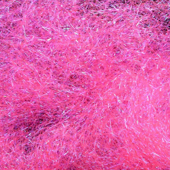 Hareline Ice Dub in UV Fluorescent Hot Pink – reflective synthetic dubbing ideal for adding flash and color to nymphs, emergers, and streamers.