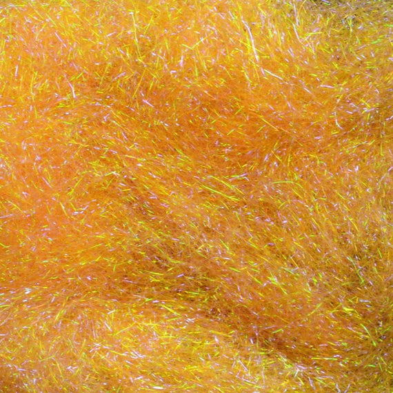 Hareline Ice Dub in UV Shrimp Pink – reflective synthetic dubbing ideal for adding flash and color to nymphs, emergers, and streamers.