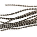 Keough Saddle Value Pack in grizzly – barred feathers with natural mottling, ideal for dry flies and adding realistic contrast to fly patterns.