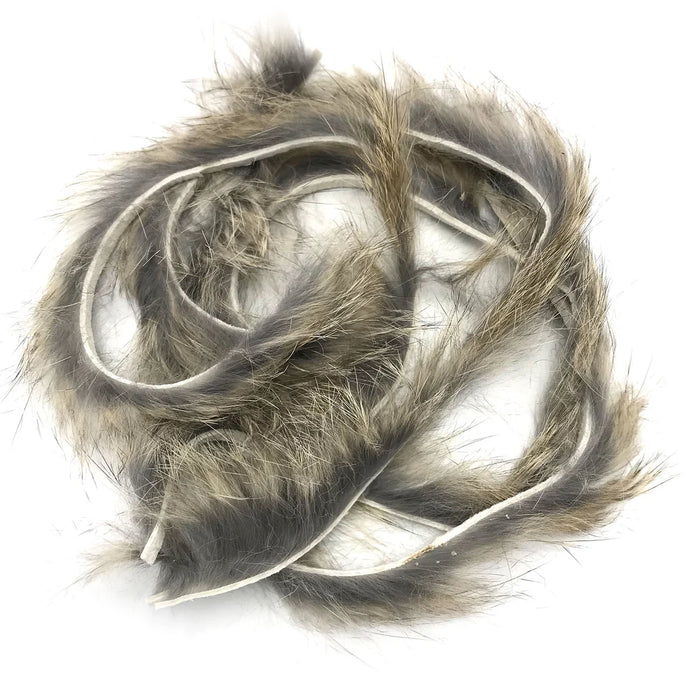 Micro Rabbit Strip in grizzly – barred black and white for a natural, mottled look in streamers and leeches.