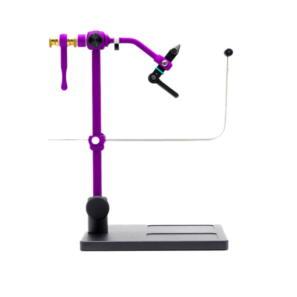 Renzetti Traveler 2600 Series fly tying vise with standard pedestal base – true rotary vise in anodized purple finish, designed for precision and portability across a wide range of fly sizes.