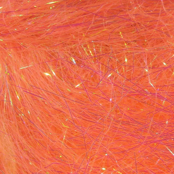 Hareline Ripple Ice Dub in Shell Pink – soft pink dubbing with iridescent sheen, great for shrimp patterns, eggs, and subtle attractor flies.