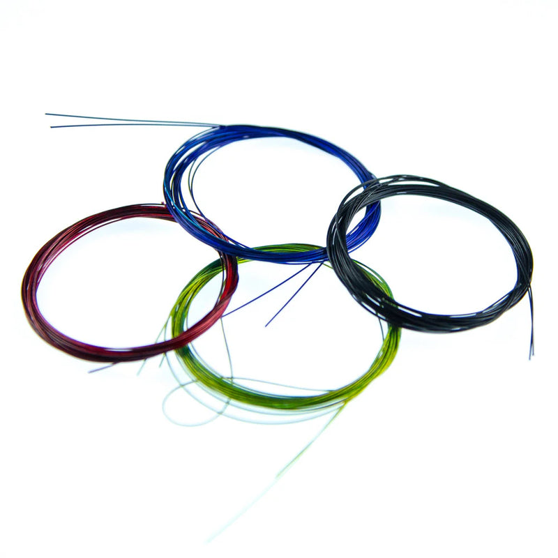 Spools of Senyo’s Trout Wire by Hareline, designed for delicate segmentation and ribbing on trout flies, with vibrant color options and a strong, fine-gauge build perfect for micro patterns.