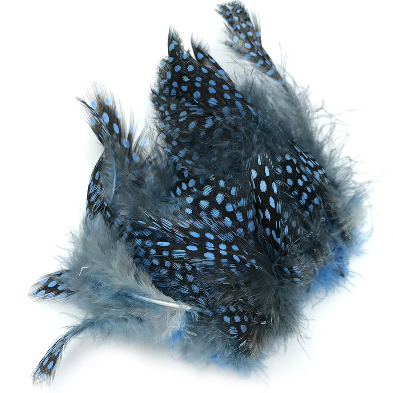 Hareline Strung Guinea Feather in Baby Blue – soft pastel blue feather with distinct speckling, ideal for subtle steelhead flies, winter patterns, and delicate accents on wet flies.