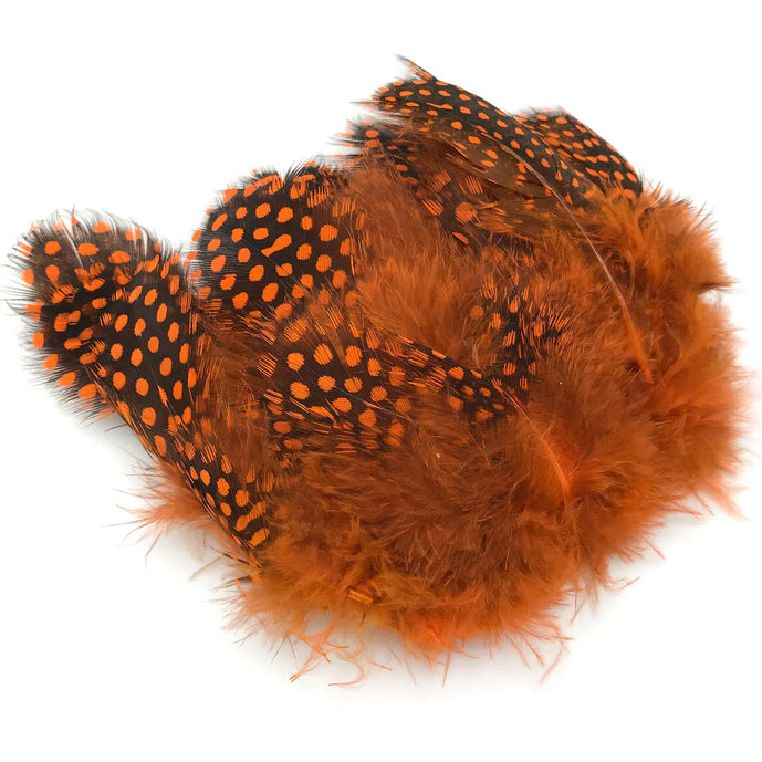 Hareline Strung Guinea Feather in Orange – bold orange feather with spotted markings, great for salmon and steelhead streamers.