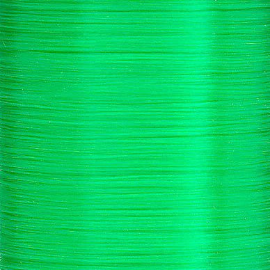 Spool of UTC fluorescent green fly tying thread, great for hot spots, tags, and vibrant accent wraps on nymphs and streamers.