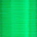 Spool of UTC fluorescent green fly tying thread, great for hot spots, tags, and vibrant accent wraps on nymphs and streamers.