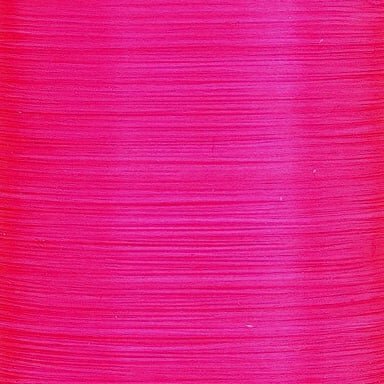 Fluorescent cerise UTC thread spool – bright pink thread for eggs, steelhead, and attention-grabbing patterns.