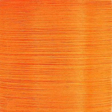 Fluorescent orange UTC thread spool – neon orange thread ideal for egg patterns and high-contrast nymphs.