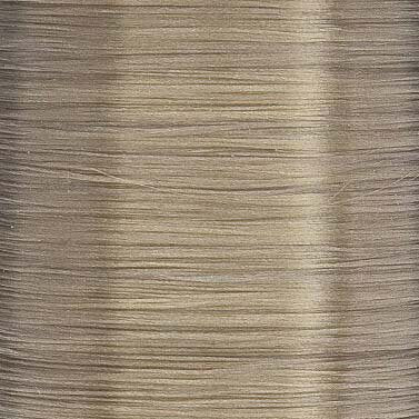 Tan UTC fly tying thread spool – light brown thread ideal for caddis, hoppers, and earthy fly bodies.
