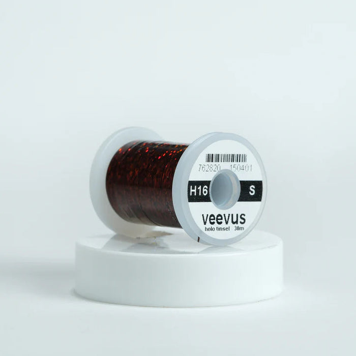 Veevus Holographic Tinsel in Brown – bold, reflective fly tying tinsel perfect for creating vibrant bodies, ribbing, and accents on trout, steelhead, and saltwater flies. Available in medium and large sizes.