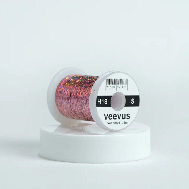Veevus Holographic Tinsel in Pink – bold, reflective fly tying tinsel perfect for creating vibrant bodies, ribbing, and accents on trout, steelhead, and saltwater flies. Available in medium and large sizes.