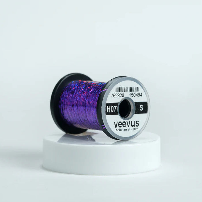 Veevus Holographic Tinsel in Purple – bold, reflective fly tying tinsel perfect for creating vibrant bodies, ribbing, and accents on trout, steelhead, and saltwater flies. Available in medium and large sizes.