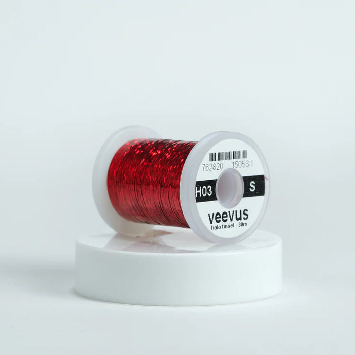 Veevus Holographic Tinsel in Red – bold, reflective fly tying tinsel perfect for creating vibrant bodies, ribbing, and accents on trout, steelhead, and saltwater flies. Available in medium and large sizes.