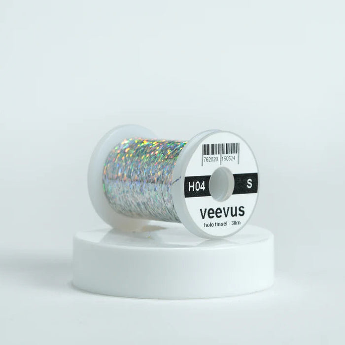 Veevus Holographic Tinsel in Silver – bold, reflective fly tying tinsel perfect for creating vibrant bodies, ribbing, and accents on trout, steelhead, and saltwater flies. Available in medium and large sizes.