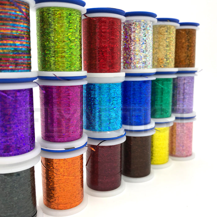 Veevus Holographic Tinsel – premium, durable fly tying tinsel with a bold holographic flash. Perfect for bodies, ribbing, and accents on trout, steelhead, and saltwater flies. Available in medium and large widths across a full spectrum of vibrant, eye-catching colors.