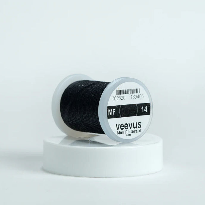 Veevus Mini Flat Braid in Black – adds a flat, highly reflective shimmer to fly patterns. Perfect for bodies, tags, and ribbing with a modern flash in black.