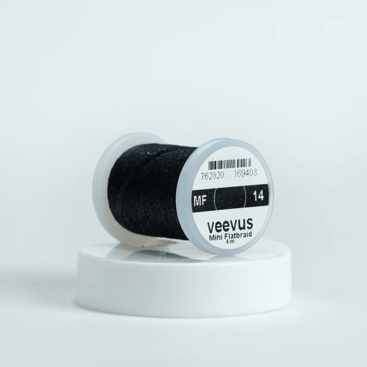 Veevus Mini Flat Braid in Black – adds a flat, highly reflective shimmer to fly patterns. Perfect for bodies, tags, and ribbing with a modern flash in black.