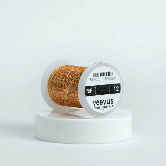 Veevus Mini Flat Braid in Copper – adds a flat, highly reflective shimmer to fly patterns. Perfect for bodies, tags, and ribbing with a modern flash in copper.