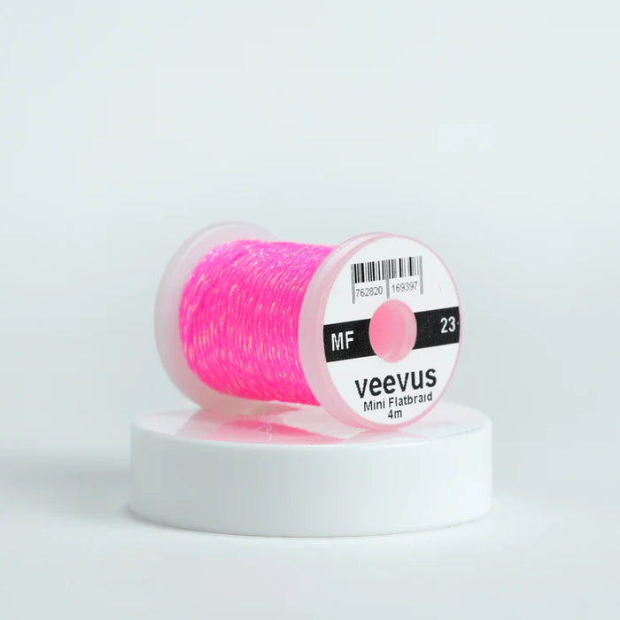 Veevus Mini Flat Braid in Fluorescent Pink – adds a flat, highly reflective shimmer to fly patterns. Perfect for bodies, tags, and ribbing with a modern flash in fluorescent pink.