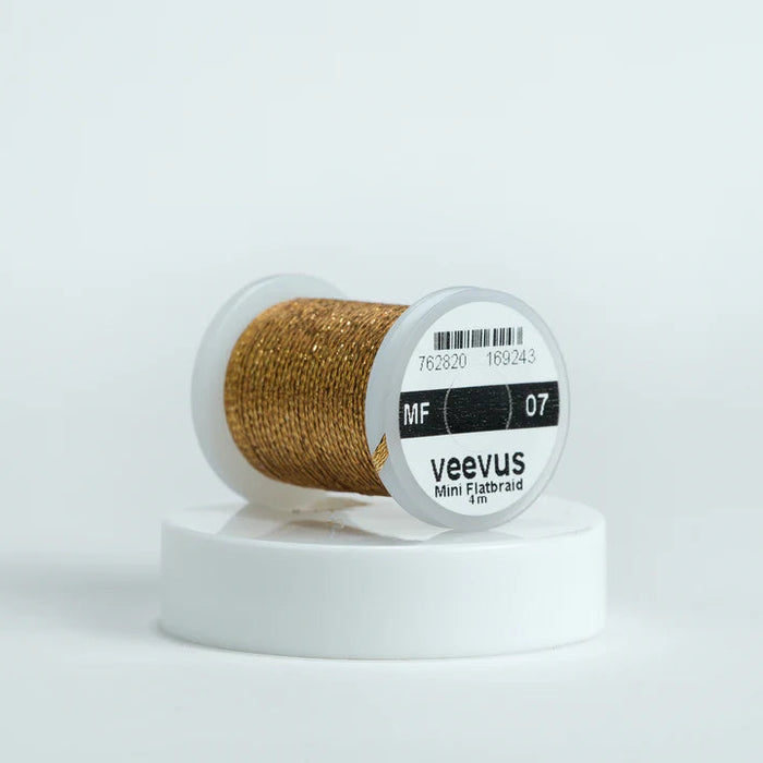 Veevus Mini Flat Braid in Old Gold – adds a flat, highly reflective shimmer to fly patterns. Perfect for bodies, tags, and ribbing with a modern flash in old gold.