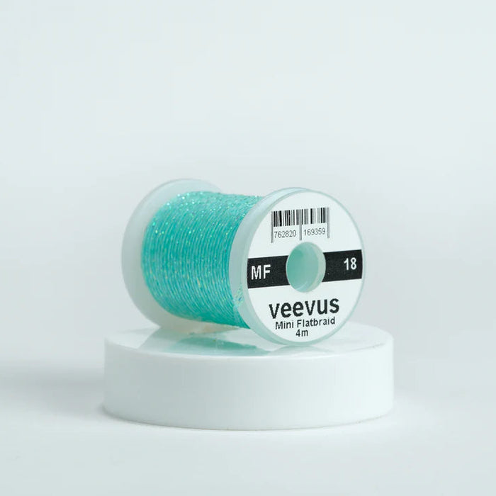 Veevus Mini Flat Braid in Teal Blue Pearl – adds a flat, highly reflective shimmer to fly patterns. Perfect for bodies, tags, and ribbing with a modern flash in teal blue pearl.