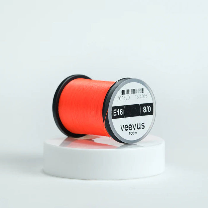 Veevus Thread in Fluorescent Orange – ultra-strong, lightweight fly tying thread available in 6/0, 8/0, and 10/0 sizes, perfect for precise, clean wraps on any pattern.