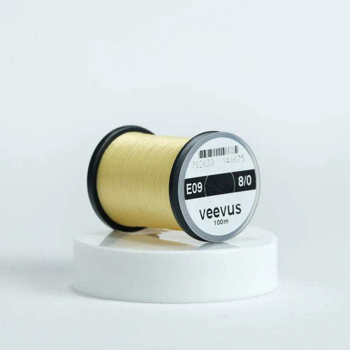 Veevus Thread in Light Cahill – ultra-strong, lightweight fly tying thread available in 6/0, 8/0, and 10/0 sizes, perfect for precise, clean wraps on any pattern.
