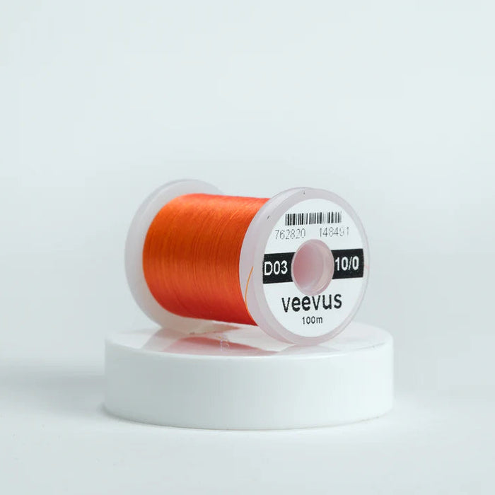 Veevus Thread in Orange – ultra-strong, lightweight fly tying thread available in 6/0, 8/0, and 10/0 sizes, perfect for precise, clean wraps on any pattern.