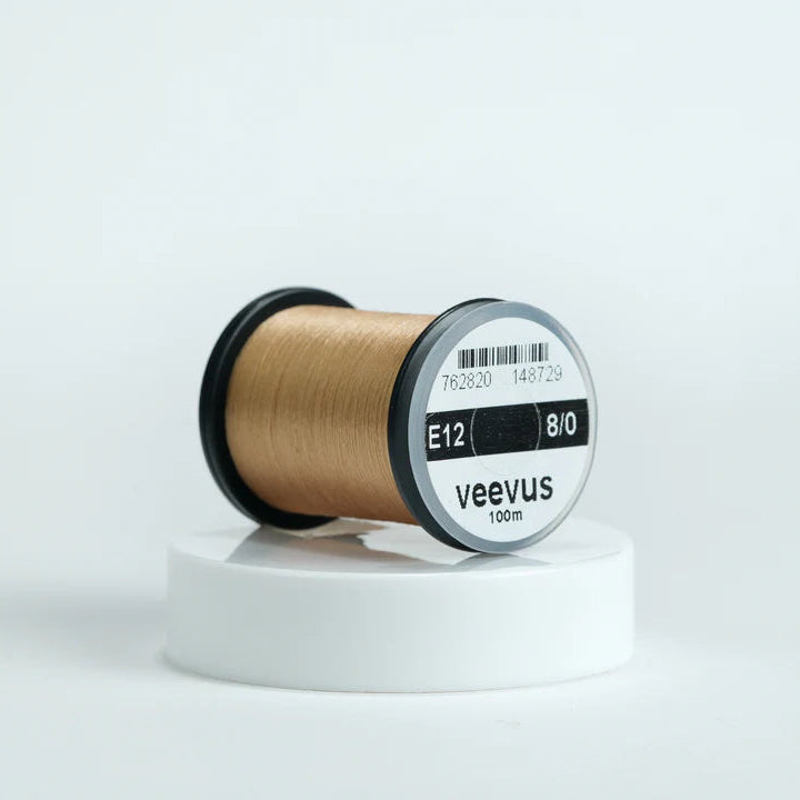 Veevus Thread in Tan – ultra-strong, lightweight fly tying thread available in 6/0, 8/0, and 10/0 sizes, perfect for precise, clean wraps on any pattern.
