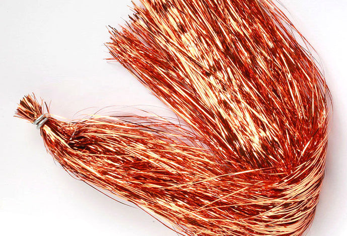 Strands of copper flashabou fly tying material, ideal for adding flash to streamers, intruders, and baitfish patterns.