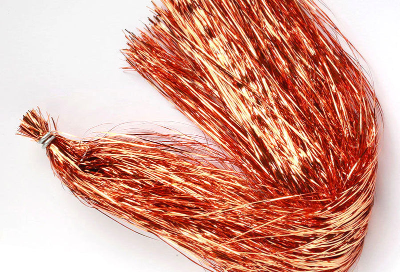 Strands of copper flashabou fly tying material, ideal for adding flash to streamers, intruders, and baitfish patterns.