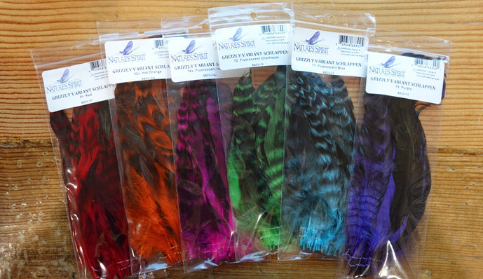Strung Grizzly Variant Schlappen by Nature’s Spirit – soft, webby fly tying feathers in assorted vibrant colors with natural grizzly barring for streamers, steelhead, and spey flies.