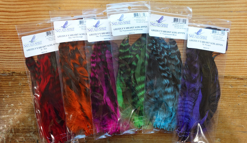 Strung Grizzly Variant Schlappen by Nature’s Spirit – soft, webby fly tying feathers in assorted vibrant colors with natural grizzly barring for streamers, steelhead, and spey flies.
