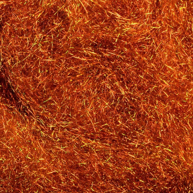 Hareline Rusty Brown Ice Dubbing – UV-reflective synthetic fly tying material with a translucent shimmer, ideal for nymphs, emergers, and attractor patterns.