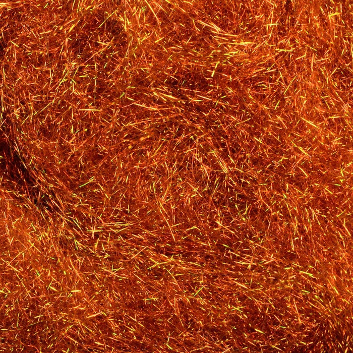 Hareline Rusty Brown Ice Dubbing – UV-reflective synthetic fly tying material with a translucent shimmer, ideal for nymphs, emergers, and attractor patterns.