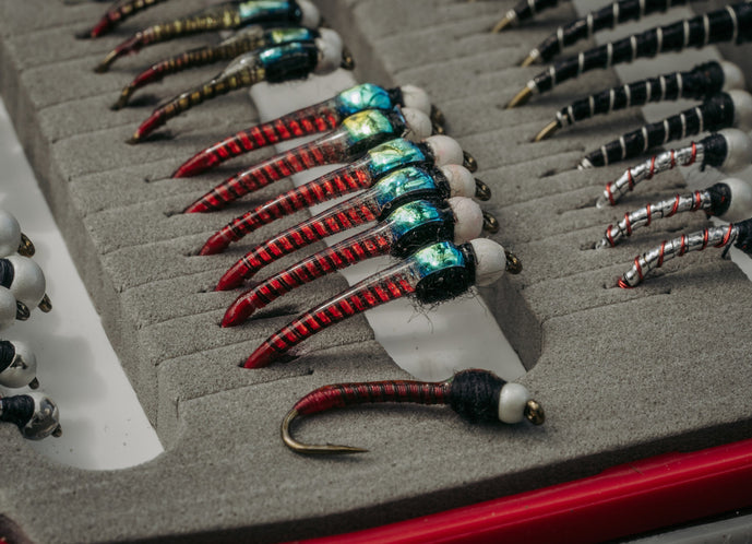 Tiemco TMC2302 humped shank hooks – 25-pack of 2X long, curved shank hooks ideal for tying extended-body dries, terrestrials, and realistic caddis or stonefly patterns.